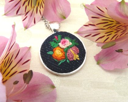 Miniature hand embroidered pendant